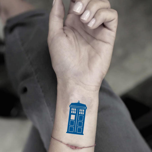 fake small tardis color temporary tattoo sticker design idea on wrist