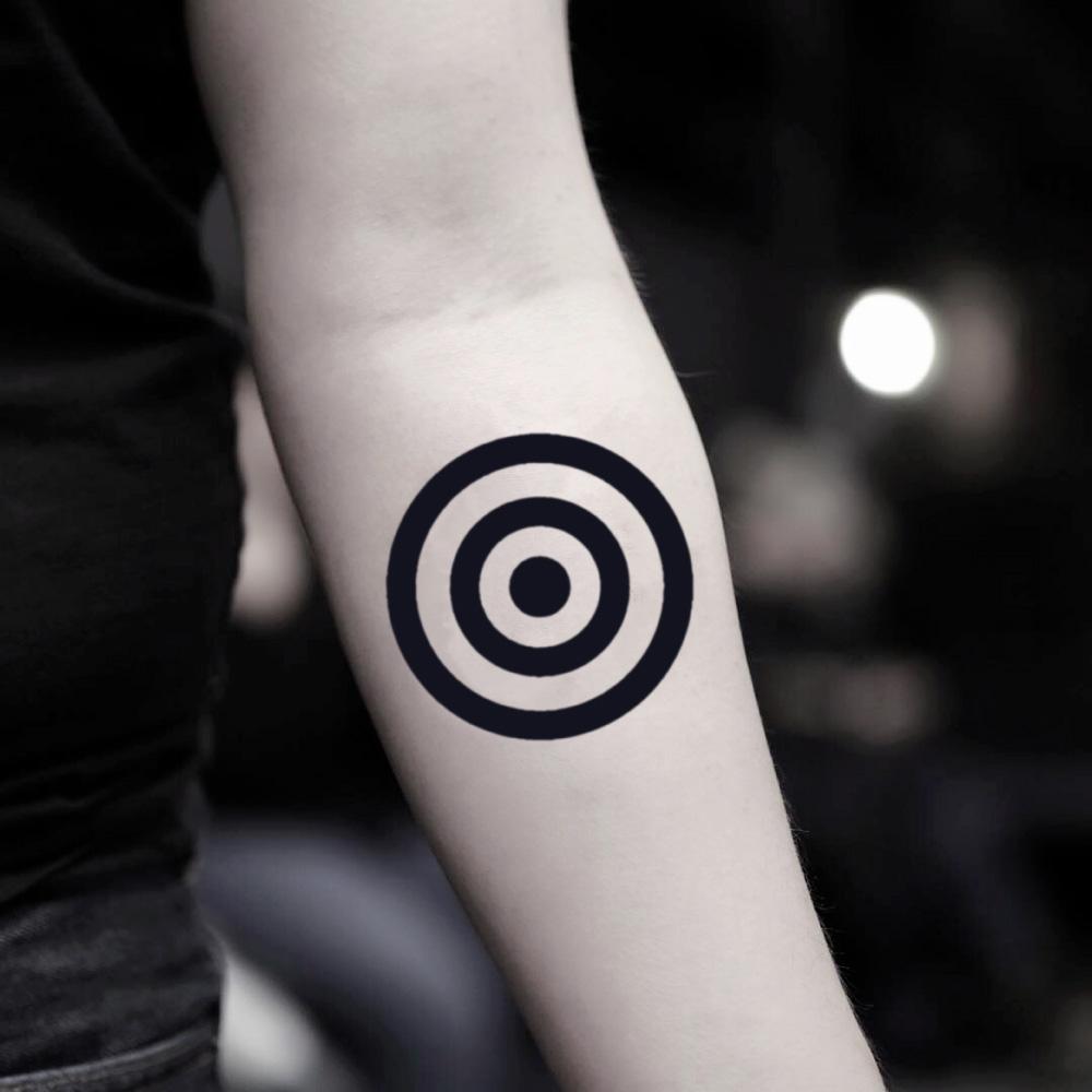 fake small target full circle geometric temporary tattoo sticker design idea on inner arm