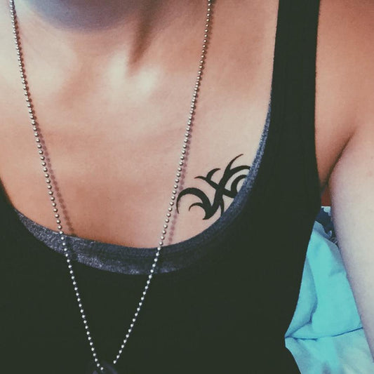 fake small black thorn mark tribal art temporary tattoo sticker design idea on chest