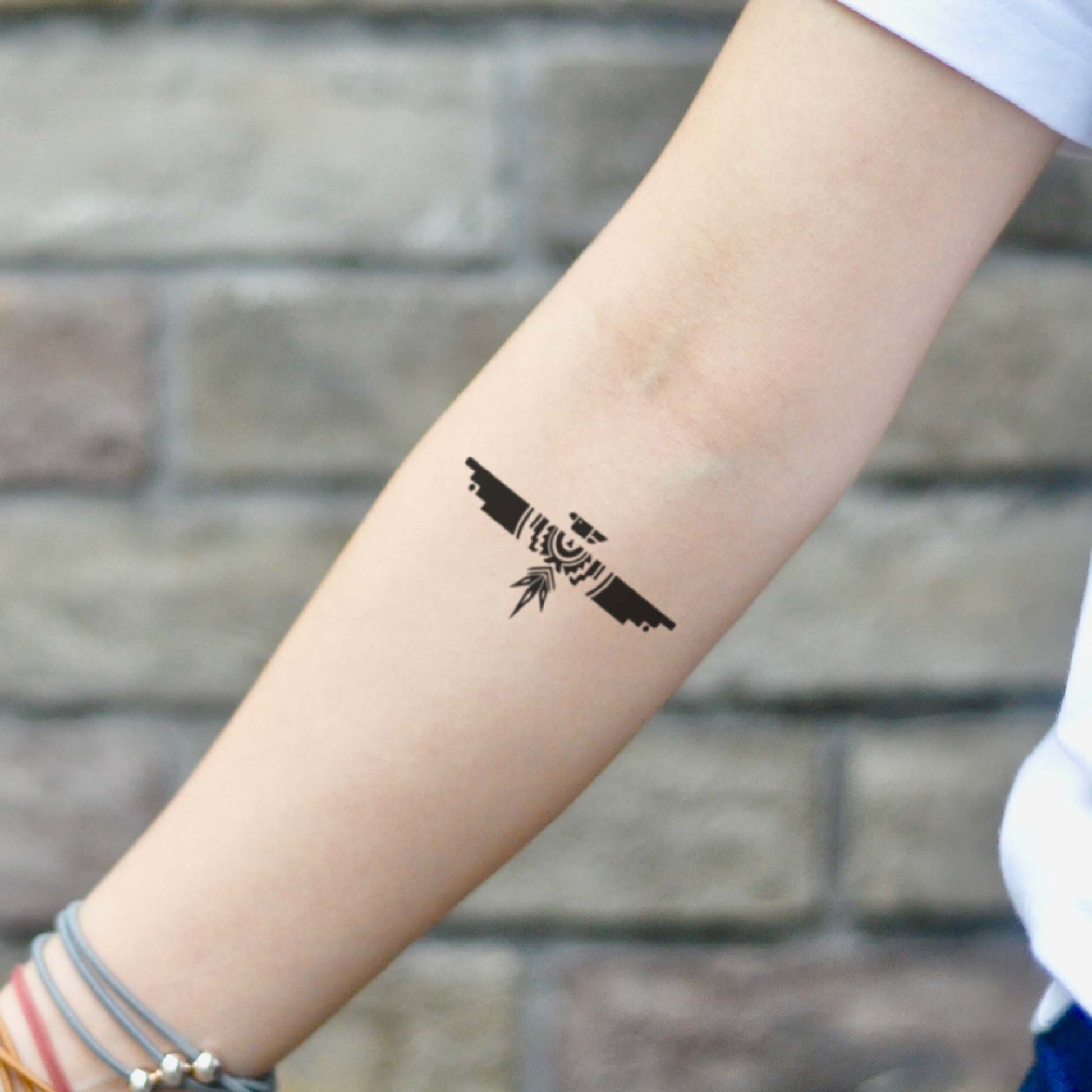 fake small tribal thunderbird bird eagle american spirit animal temporary tattoo sticker design idea on inner arm forearm