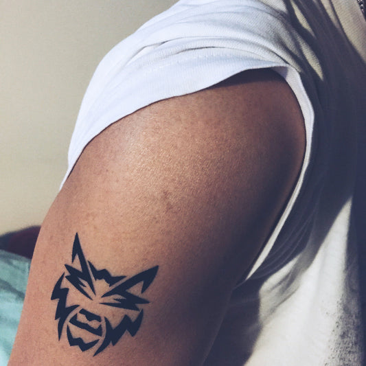 fake small celtic tiger lion animal temporary tattoo sticker design idea on upper arm