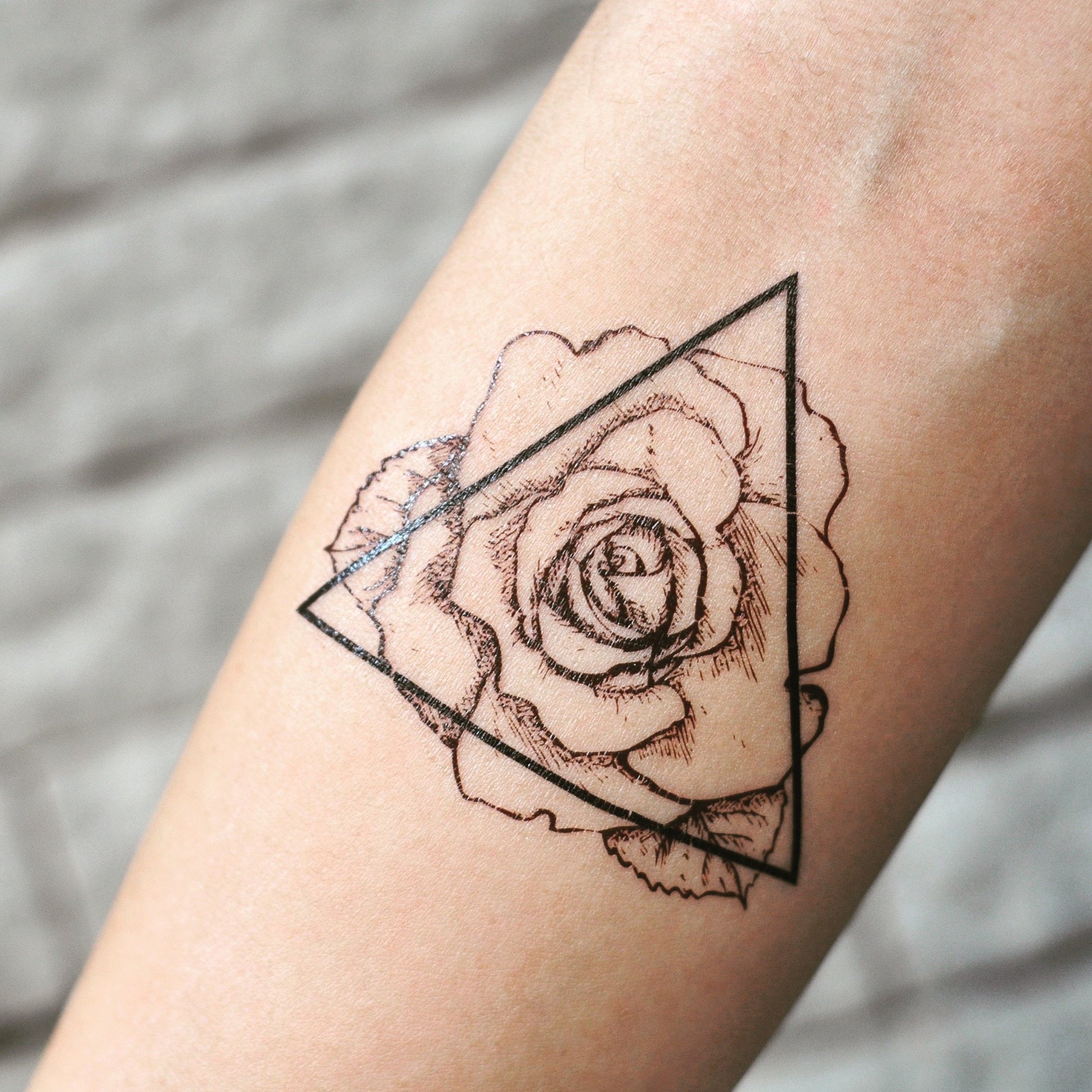 fake small triangle wild rose outline flower temporary tattoo sticker design idea on inner arm