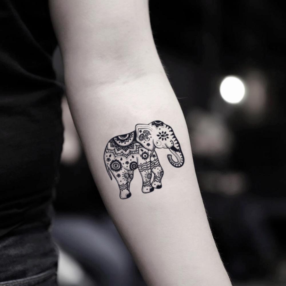 fake small tribal thai elephant animal temporary tattoo sticker design idea on inner arm