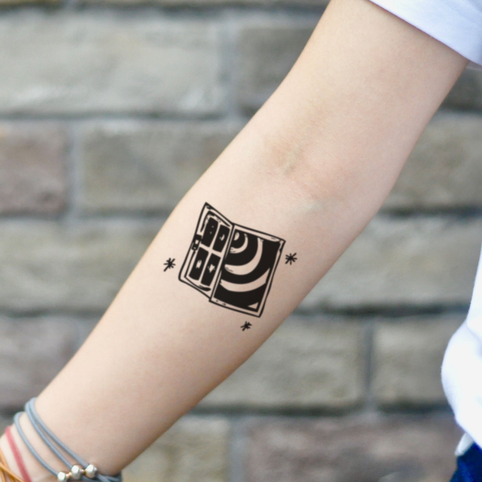 fake small twilight zone abstract trippy spiral door illustrative temporary tattoo sticker design idea on inner arm