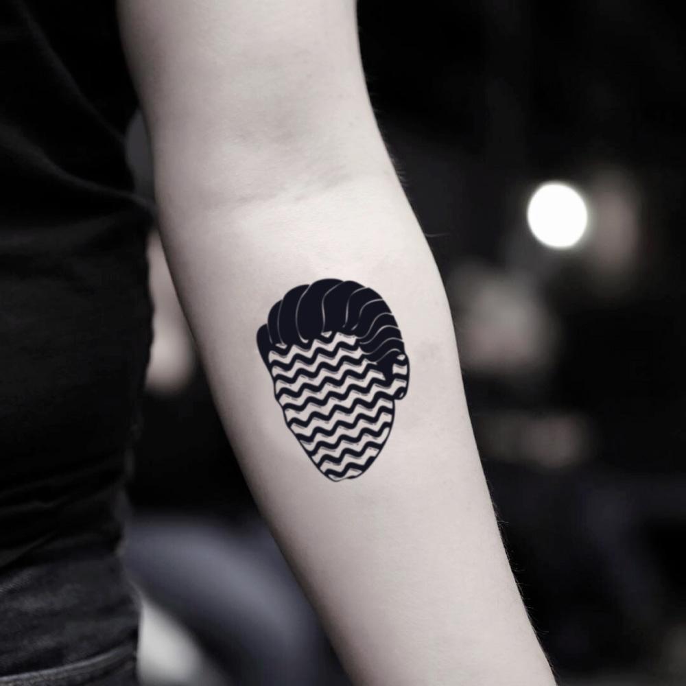 fake small psychedelic surrealistic abstract twin peaks illustrative temporary tattoo sticker design idea on inner arm