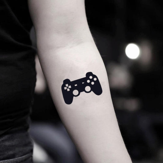 fake small video game gamer control nintendo playstation ps4 xbox controller illustrative temporary tattoo sticker design idea on inner arm
