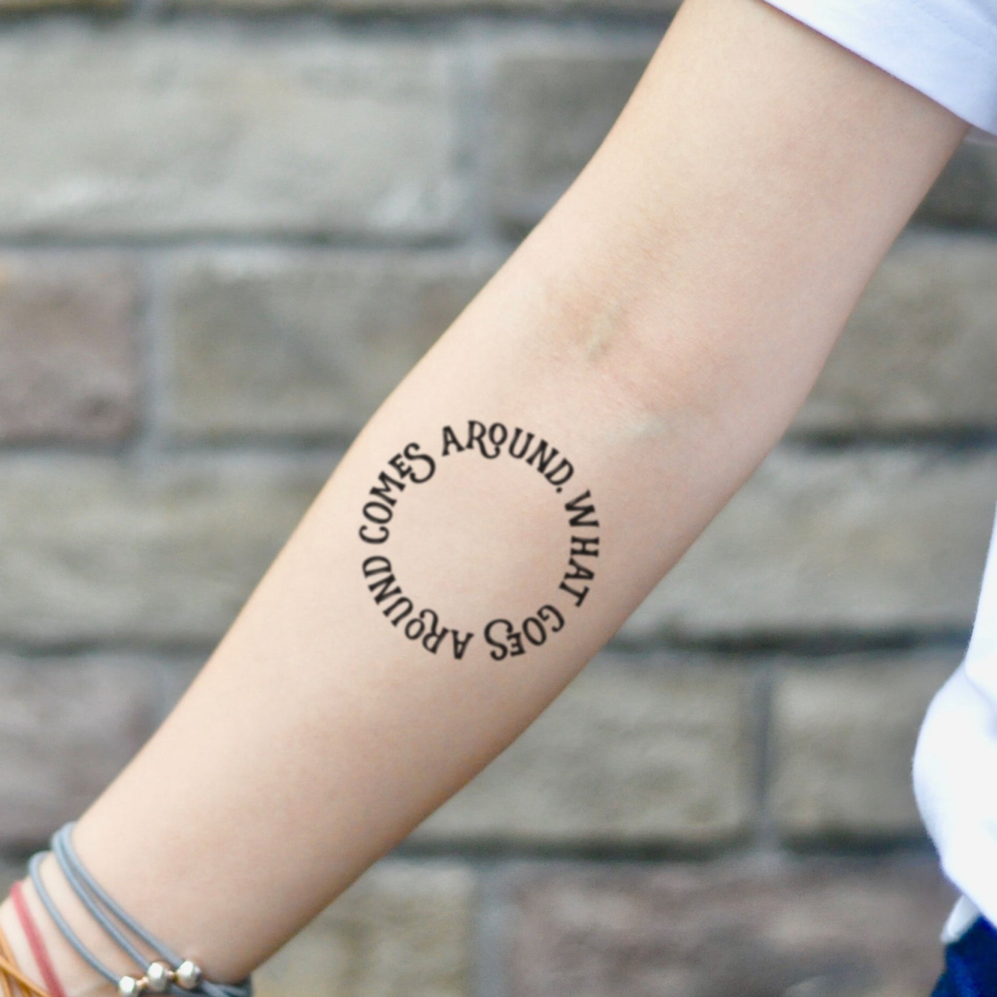 fake small what goes around comes around lettering temporary tattoo sticker design idea on inner arm