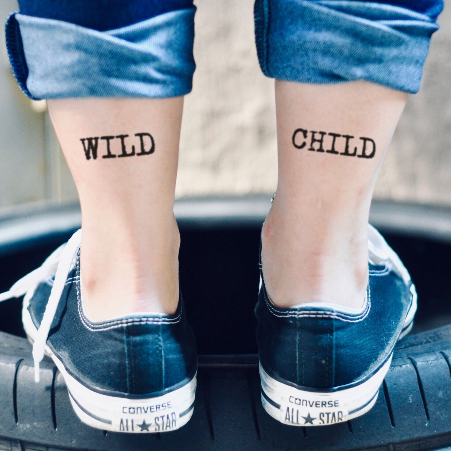 fake small wild child leg script word lettering temporary tattoo sticker design idea on ankle