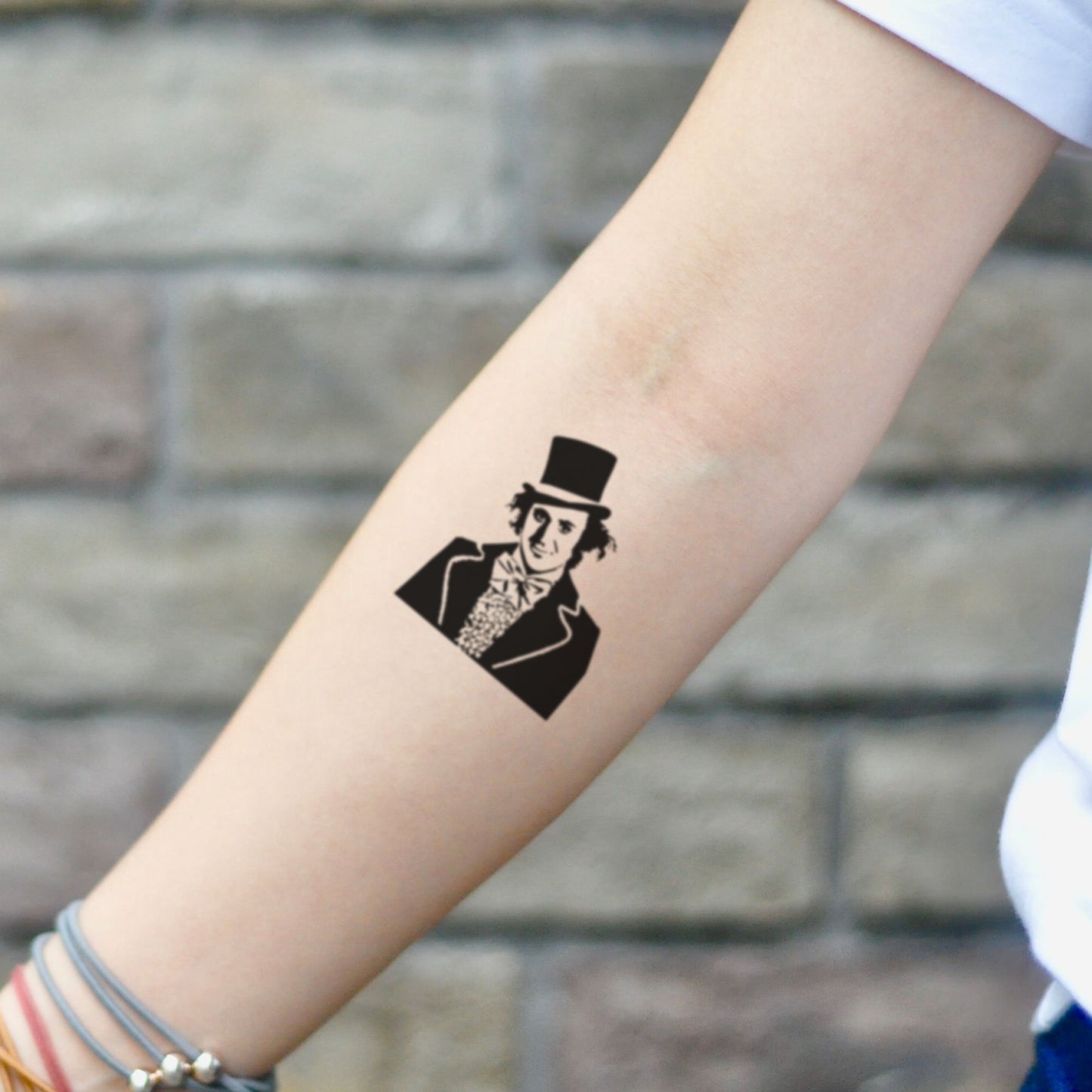 fake small willy wonka portrait temporary tattoo sticker design idea on inner arm