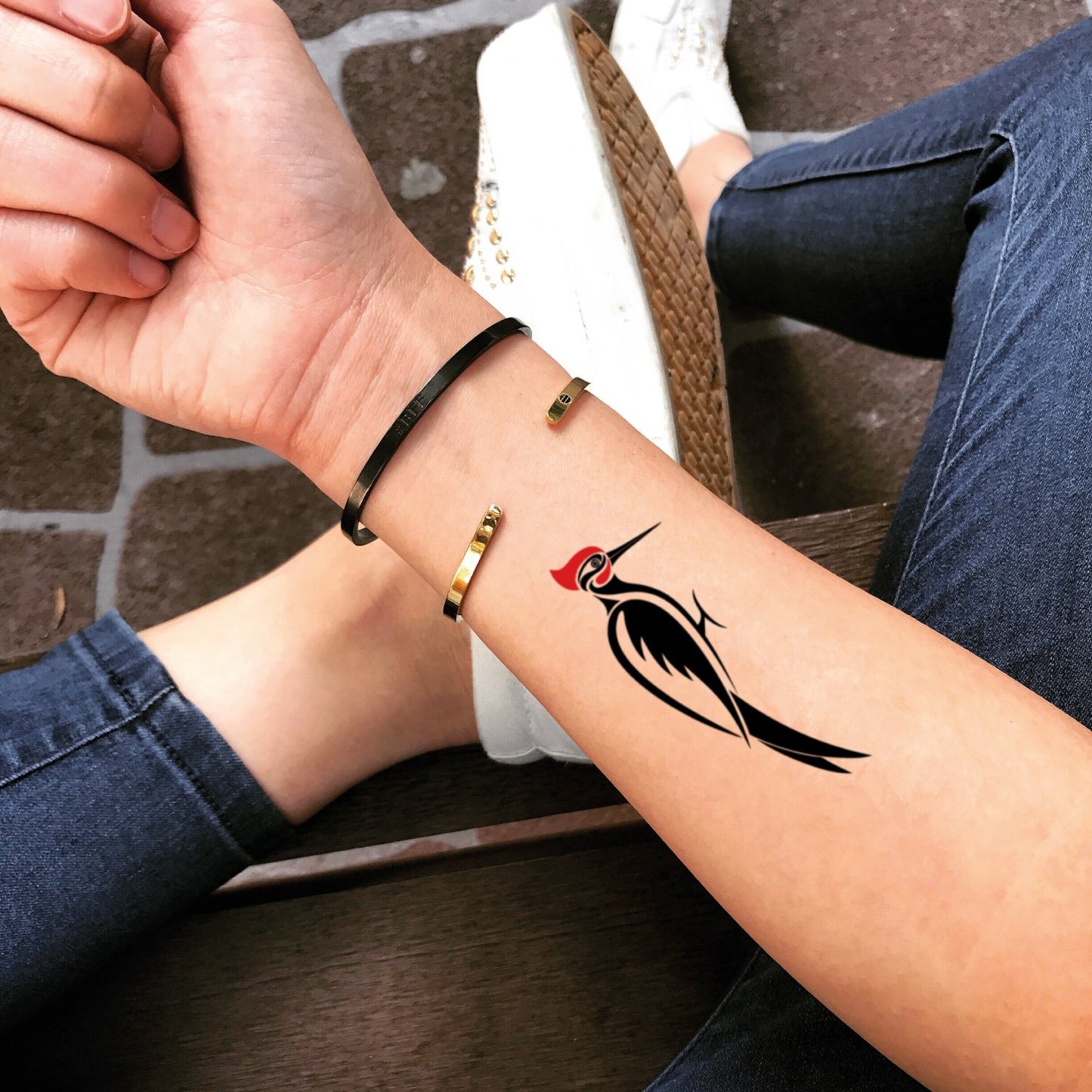fake small woodpecker animal temporary tattoo sticker design idea on wrist