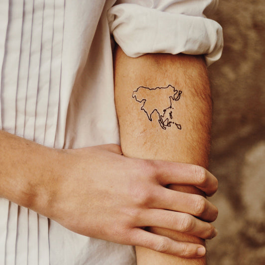 fake small best world map geographic minimalist temporary tattoo sticker design idea on inner arm
