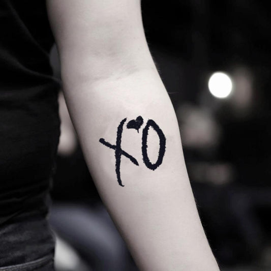 fake small the weeknd xo lettering temporary tattoo sticker design idea on inner arm