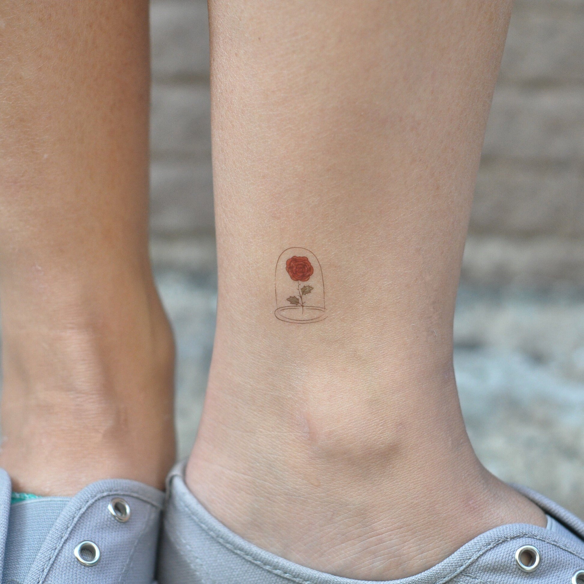 fake tiny bottle rose flower temporary tattoo sticker design idea on ankle