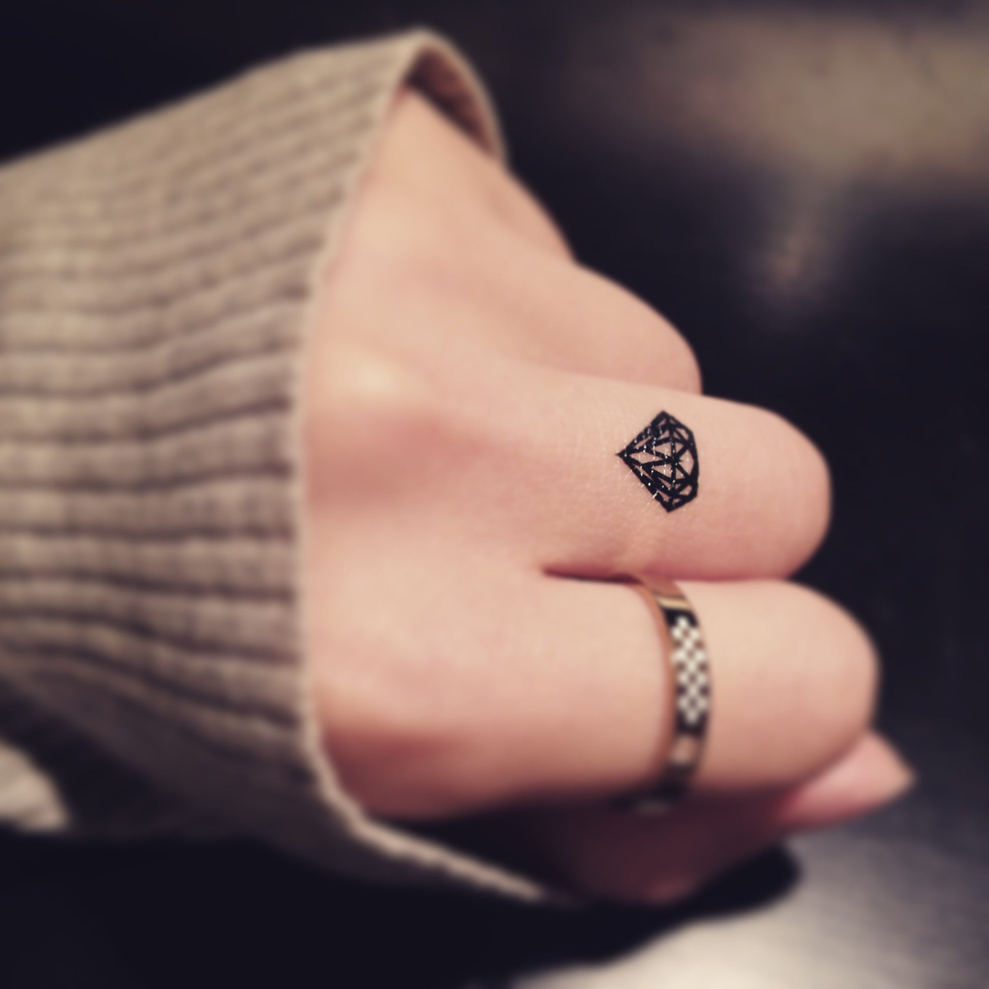 fake tiny little black diamond engagement ring marriage wedding band minimalist temporary tattoo sticker design idea on finger