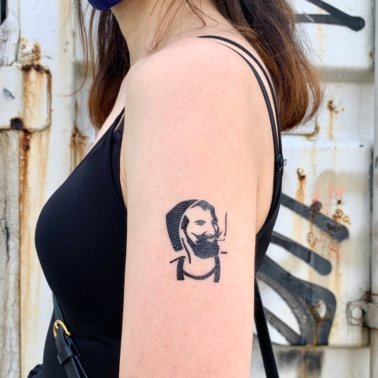 fake small zig zag man smoker art symbol minimalist temporary tattoo sticker design idea on bicep upper arm 