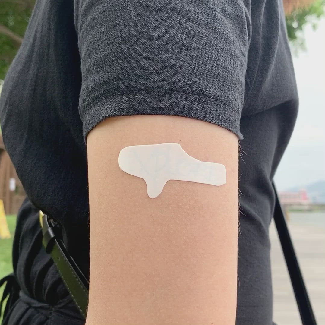 fake small explore lettering temporary tattoo sticker design idea on upper arm